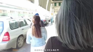 A diverting boyfriend less a imposing Oriental girl Friday close to Hong Kong